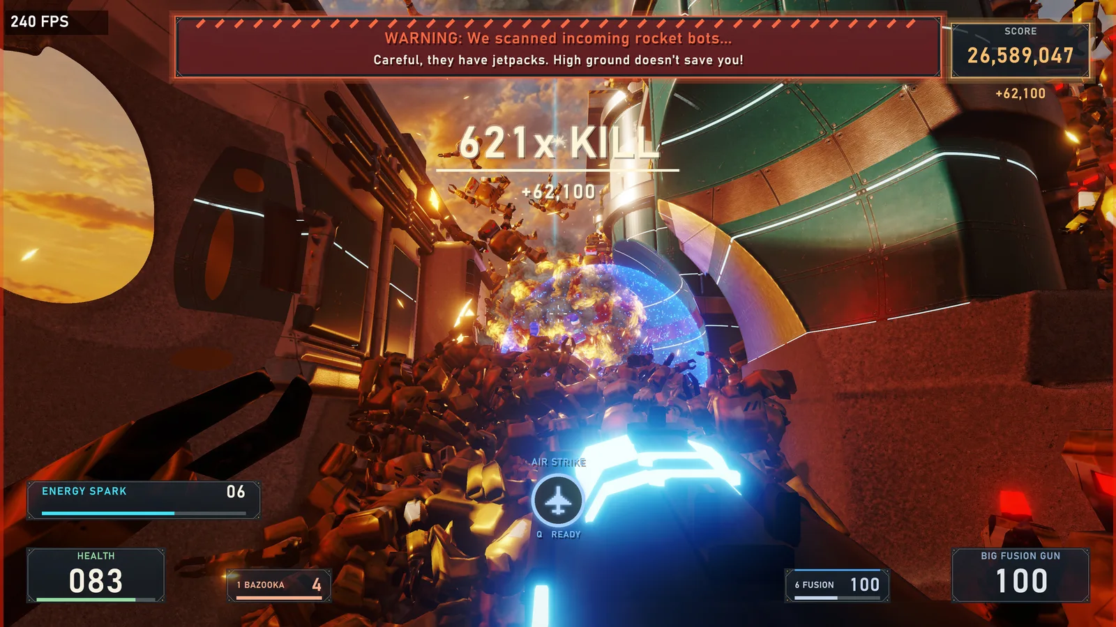 The Big Fusion Gun blasts a swarm of bots and a pile of scrap in the factory yard.